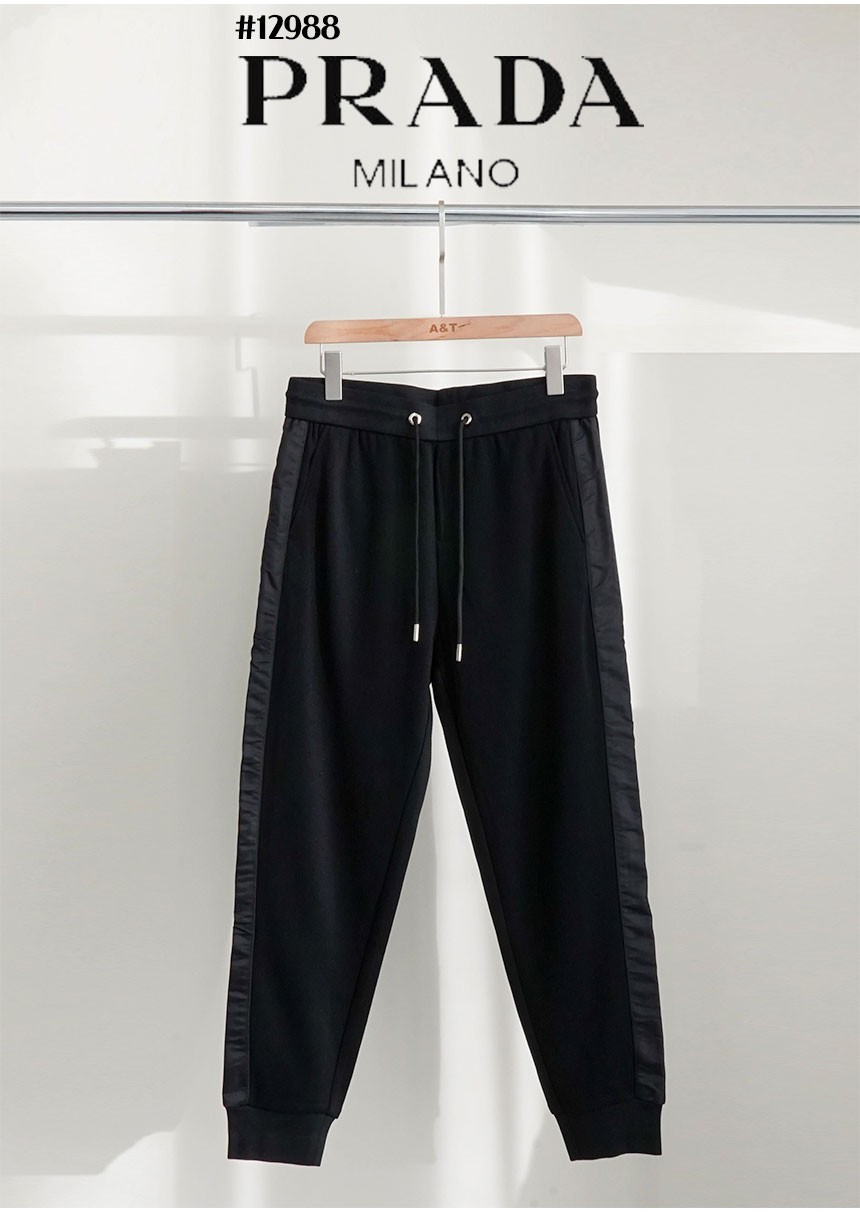 [PRADA] 프라다 포켓 삼각로고 사이드라인 리나일론 밴딩조거 팬츠 (국내배송)